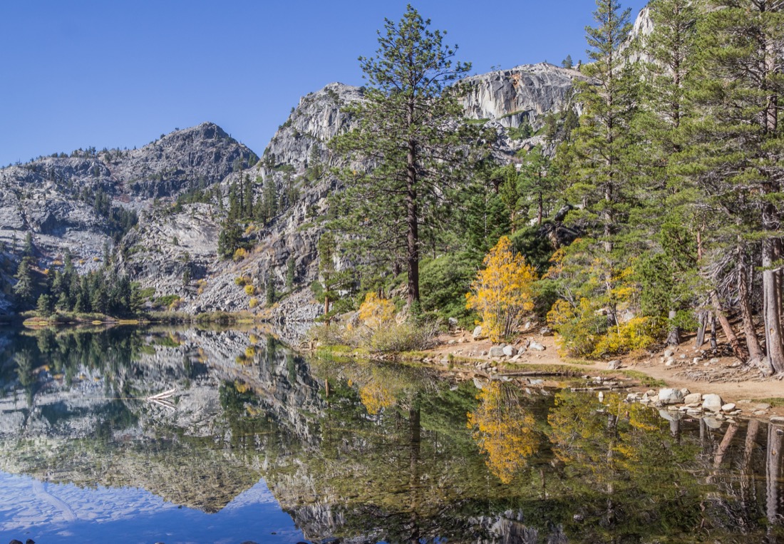 Eagle lake in California during autumn with start of fall colors on trees