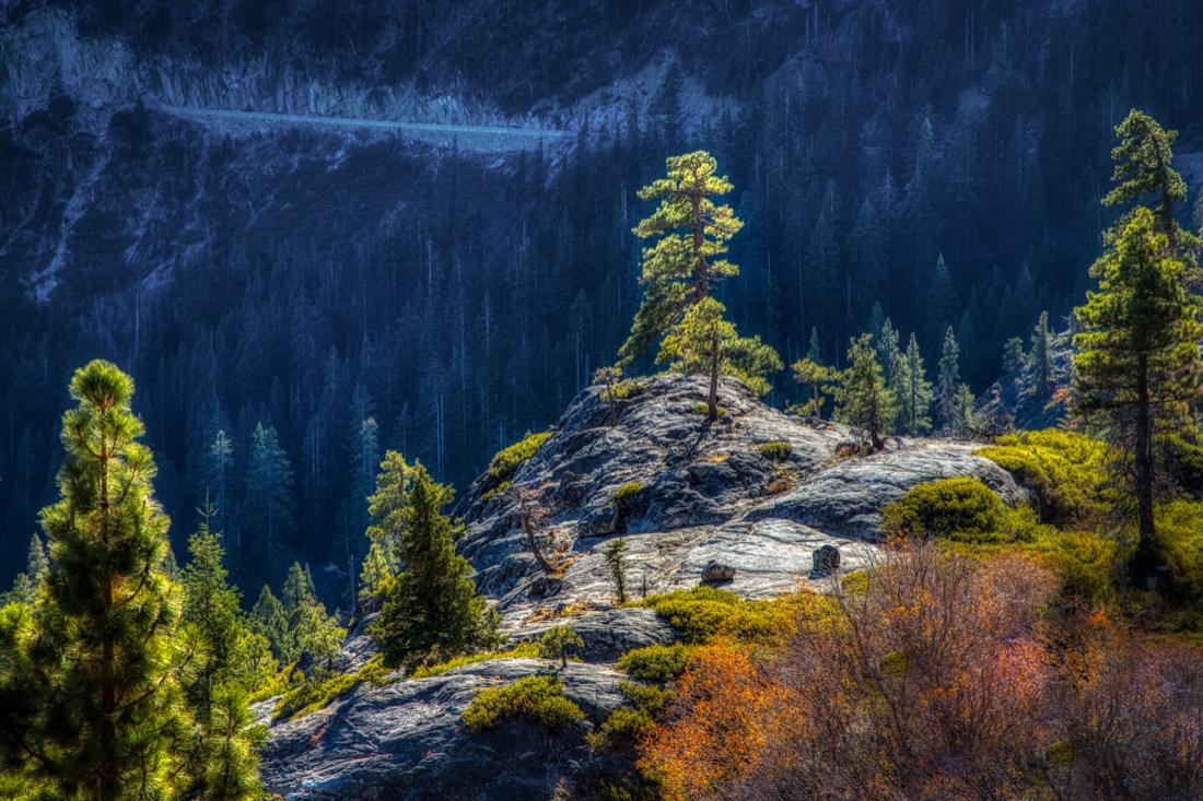 Lovely view of trees atop a cliff seen from the Vikingsholm Hiking Trail, Emerald Bay State Park, South Lake Tahoe, California