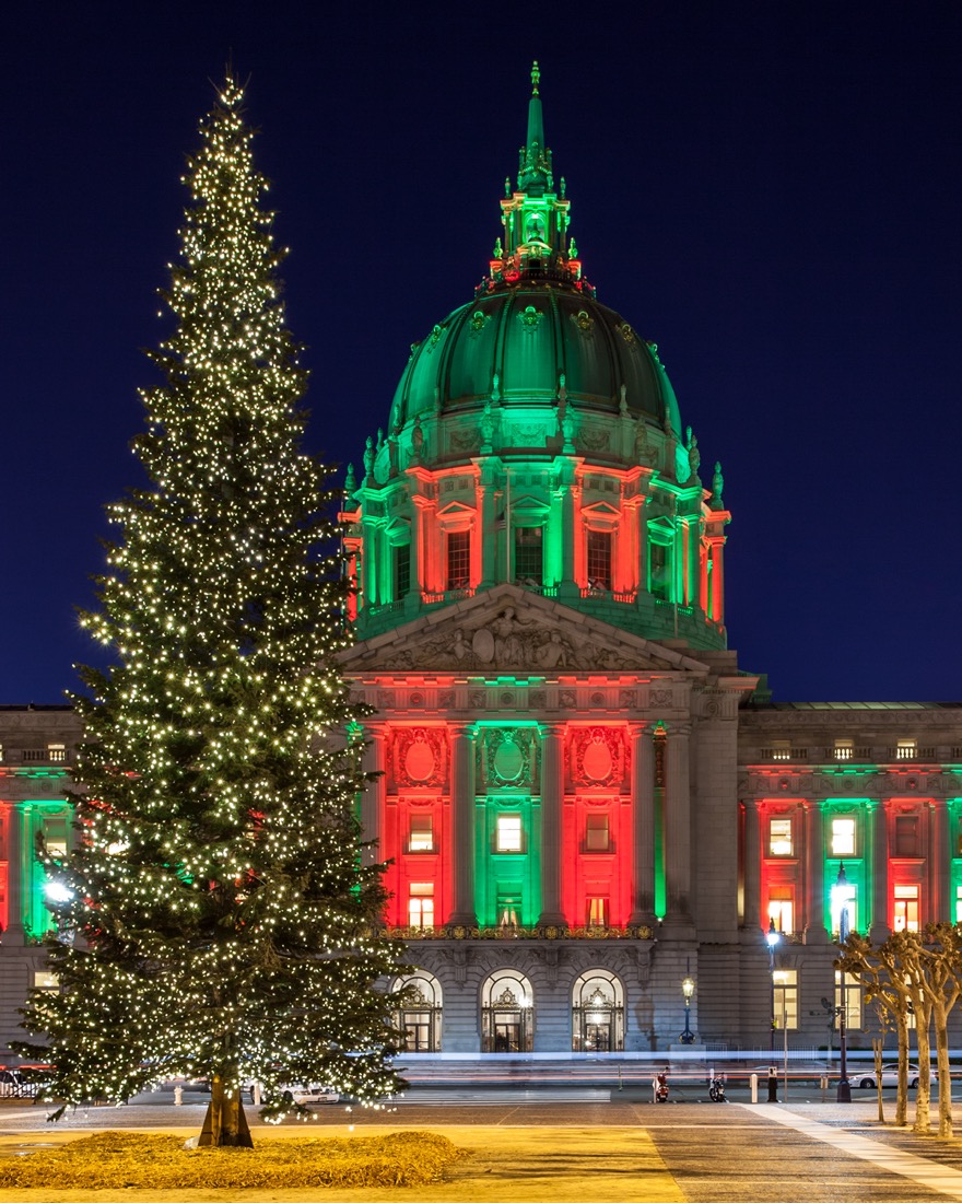 San Francisco City Hall in blue and red holiday lights and giant Christmas tree
