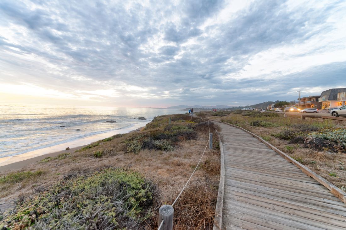 Wooden walkway along the sea at Cambria, California.