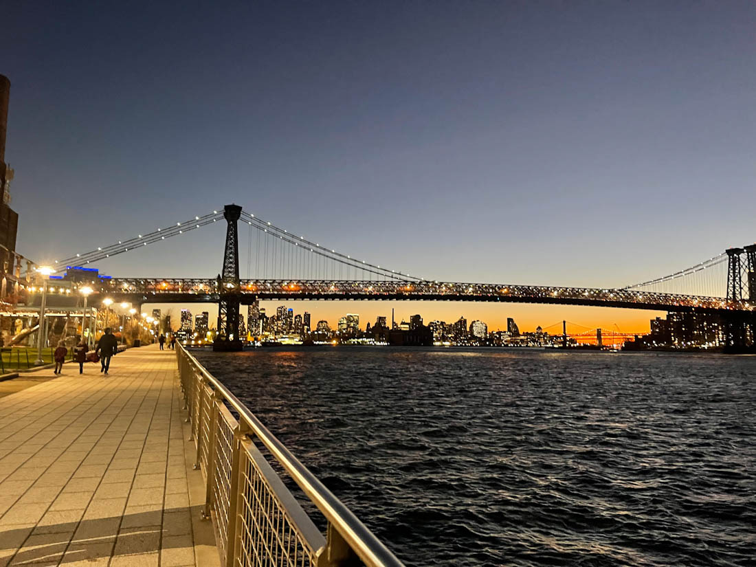 Domino Park views, sunset, night, Williamsburg, Manhattan, Brooklyn over the East River path NYC New York