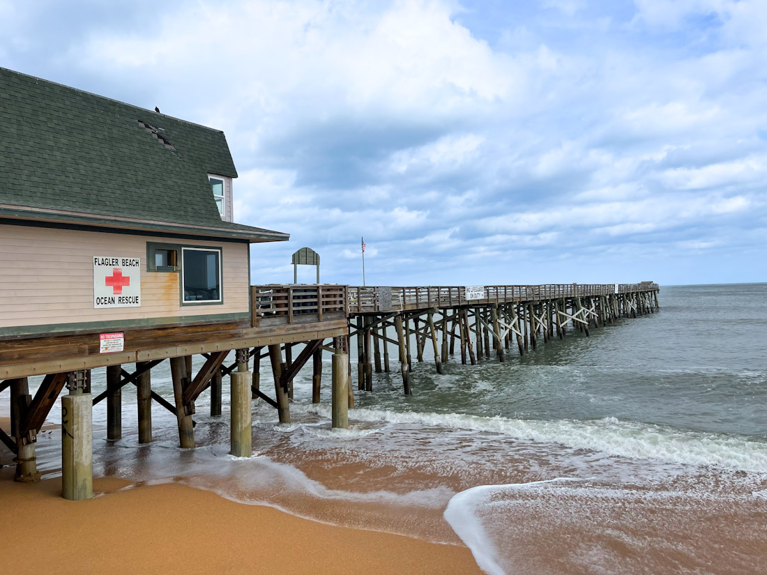 Golden sand and pier at Flagler Beach Florida