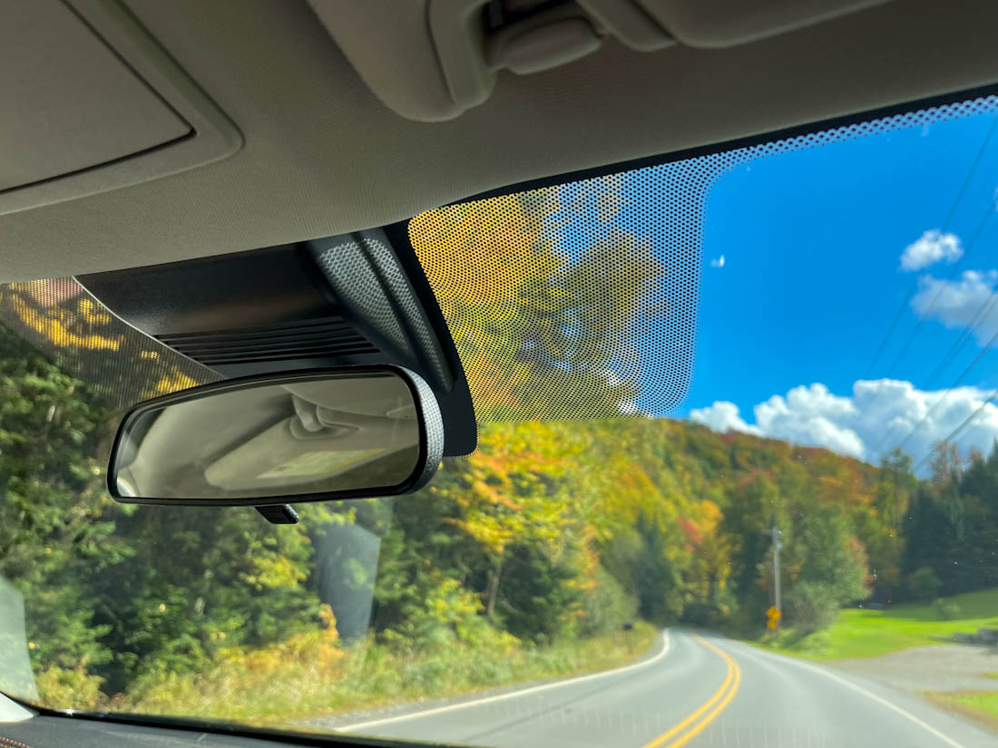 North Woods from car window in New Hampshire fall road trip