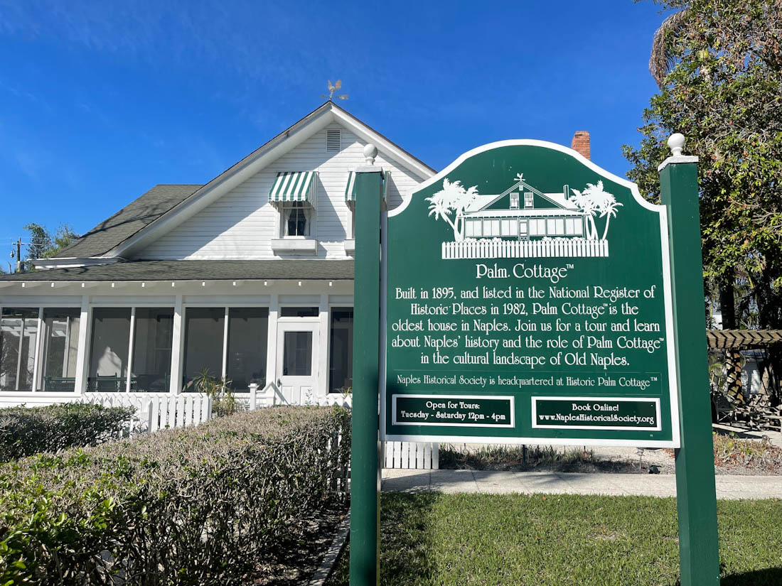 Palm Cottage Naples in Florida sign