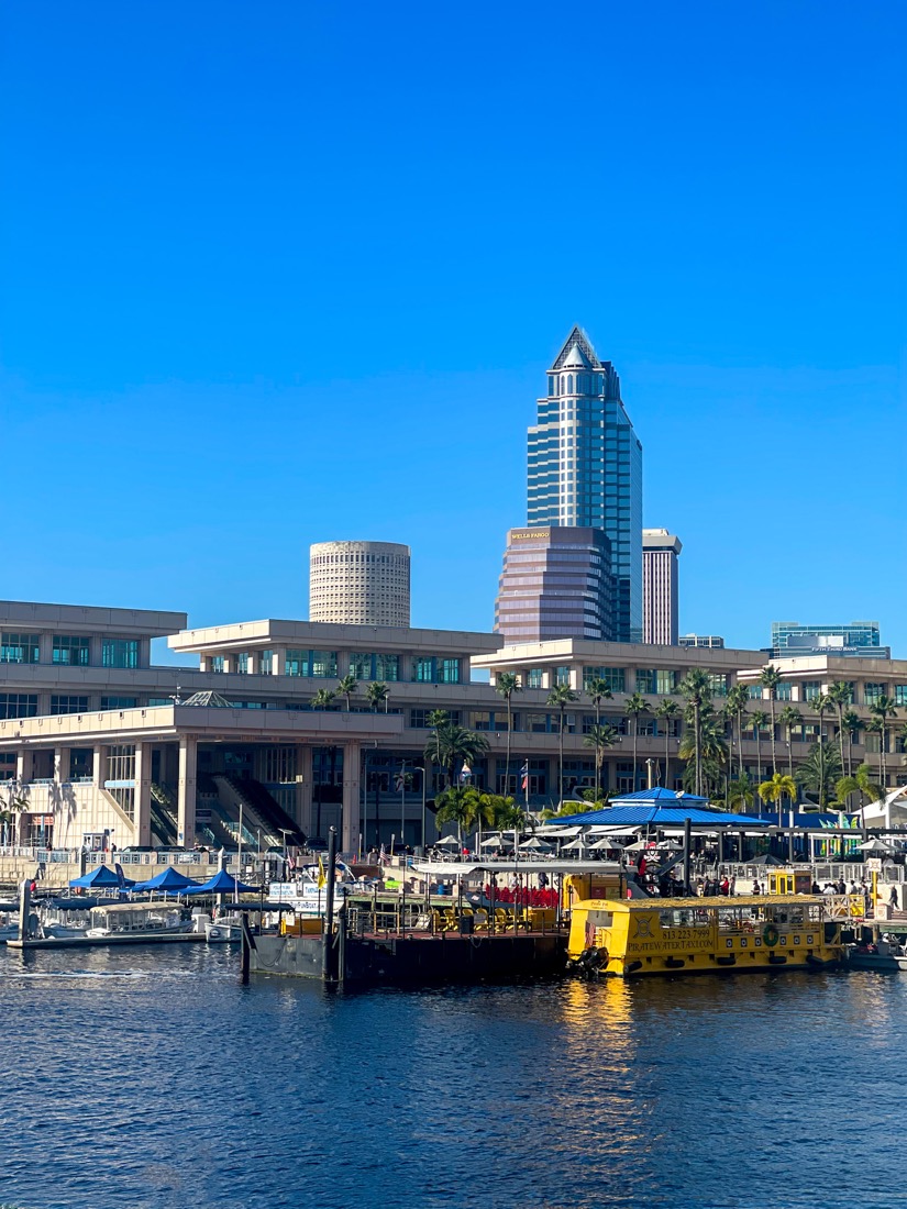 Sunny Tampa Riverwalk with boats docked