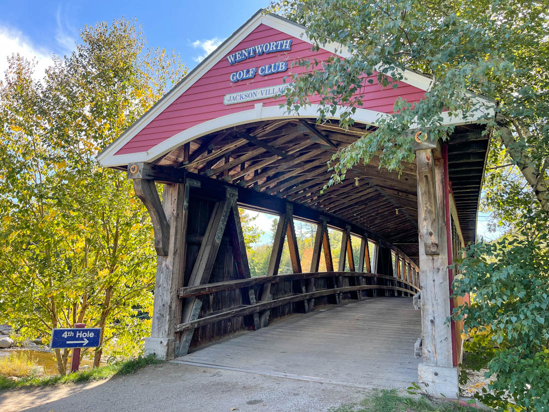 Red topped Wentworth Covered Bridge in Jackson, New Hampshire