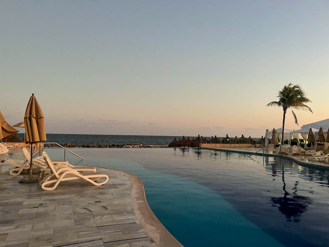 Sunset at infinity pool at Bahia Principe Akumal Mexico