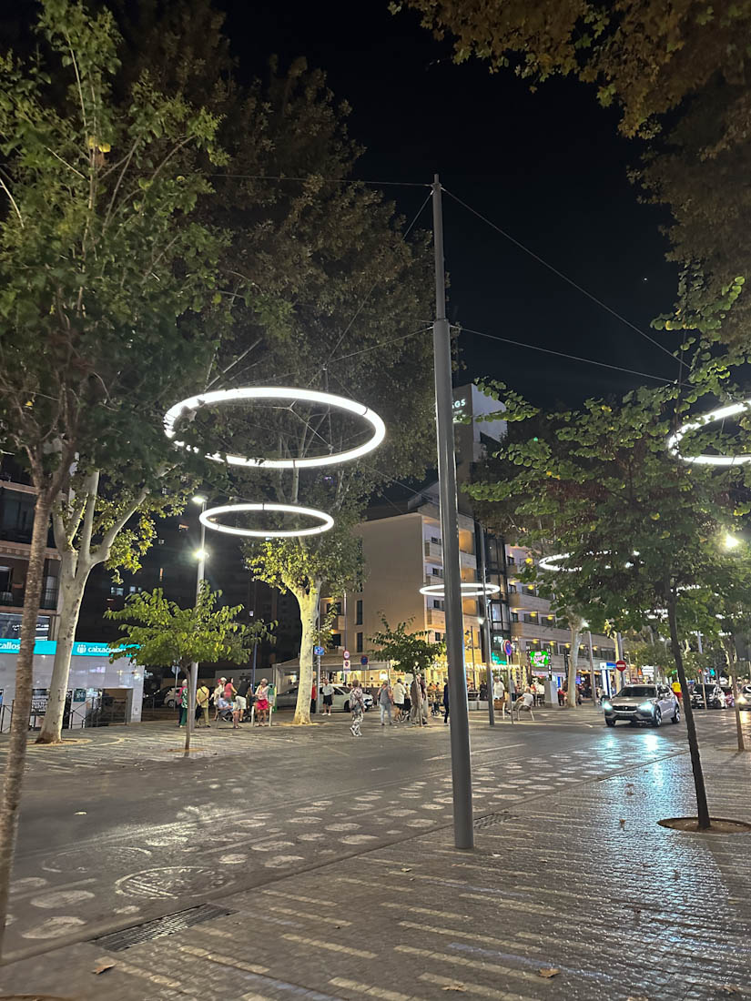 Avenida del Mediterraneo shopping street at night in Benidorm